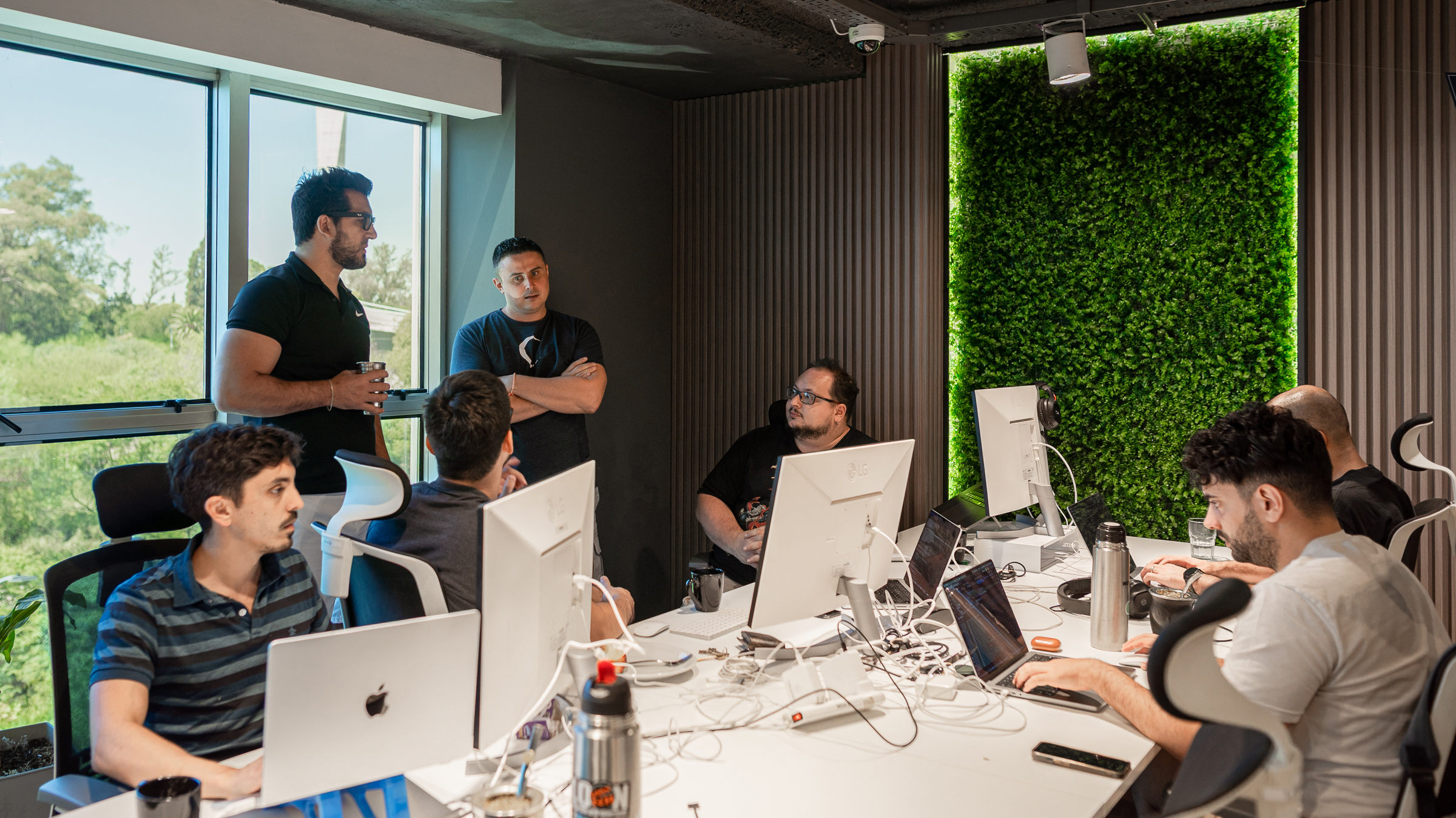 AI is Your Secret Workforce Weapon—Here’s Why 1 Our team collaborating and engaging in discussion and problem-solving.